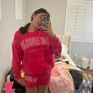 LA sweatshirt and shorts